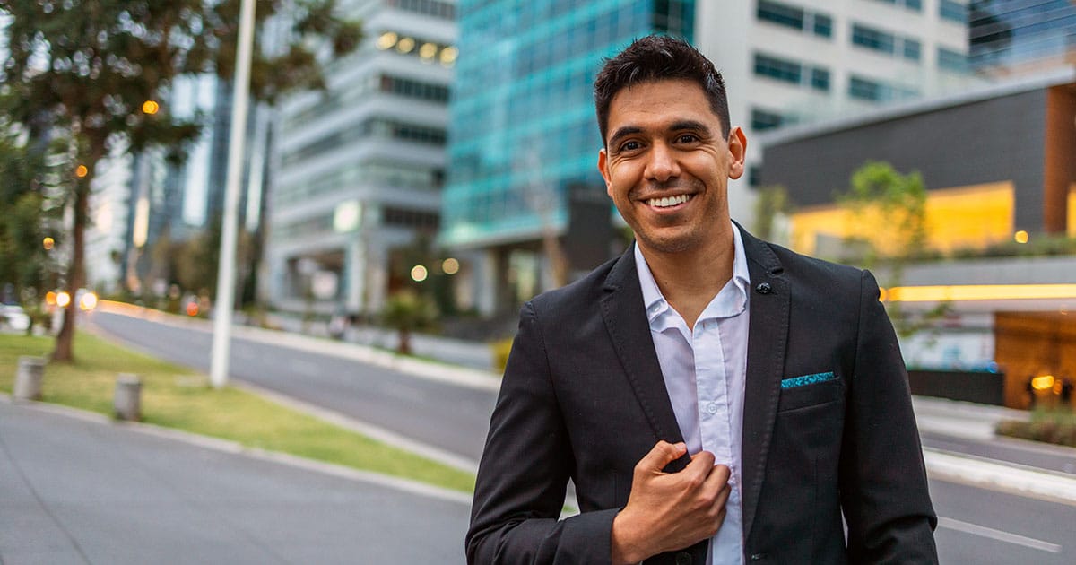 Smiling young man on a Melbourne city street.